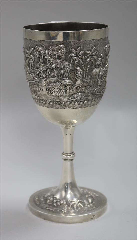 An early 20th century Indian white metal goblet, 23cm.